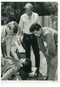 Will Hutchins (Sugarfoot on Left)  Troy Donahue middle Stan bending Aka Mark Douglas. Played a half breed Johhhy Aimsgood! Had nice hair!) 